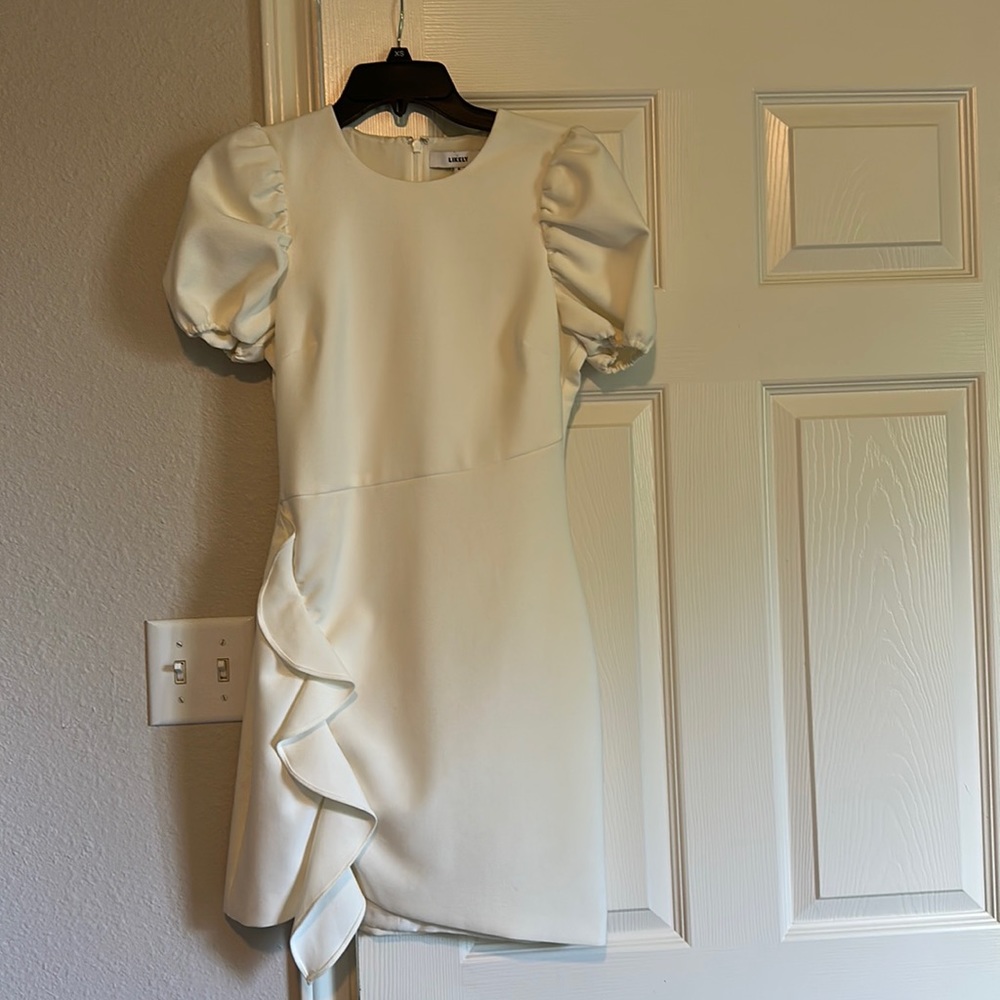 Likely size 6 short white dress
